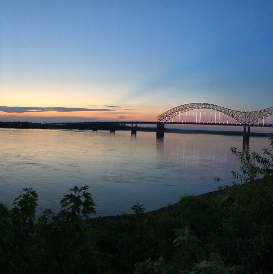 Penultimate EWN stop on the Mississippi River with a view of the river and bridge at sunset