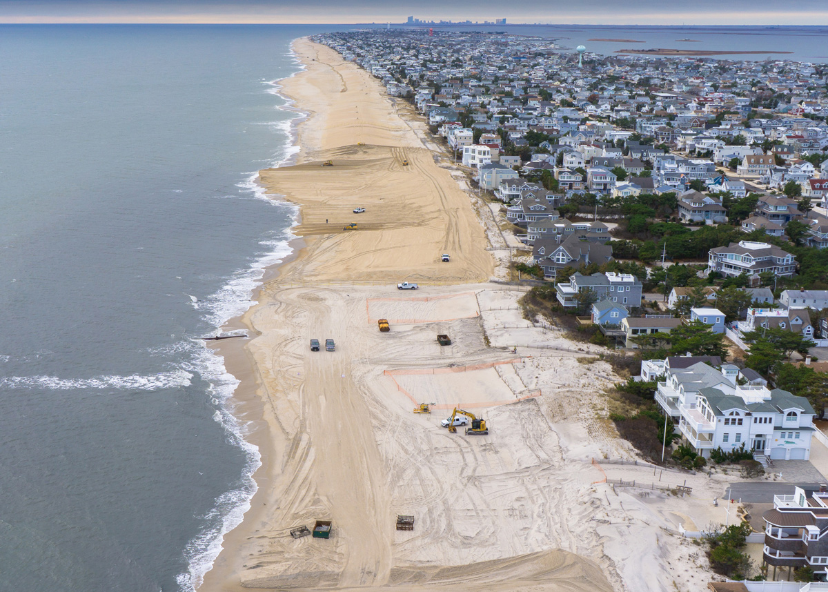 The USACE Philadelphia District pumps sand onto Brant Beach, NJ, in 2013. The work is part of an effort to restore the coastal storm risk management project from damages associated with Hurricane Sandy. (Photo by USACE Philadelphia District)